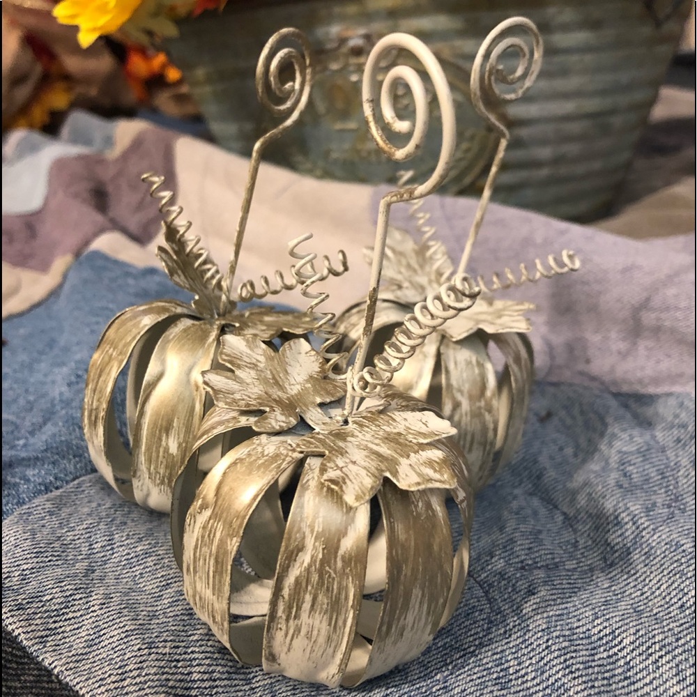 Metal pumpkins label holders.5”x2”. Lot of 3 white, 3 orange and 3 silver/gold.